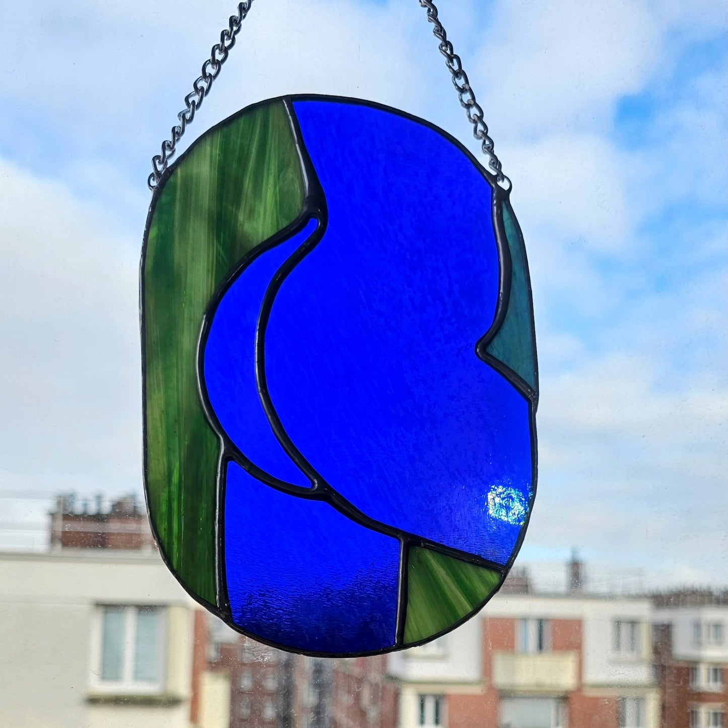 Fesses irisées vert et bleu